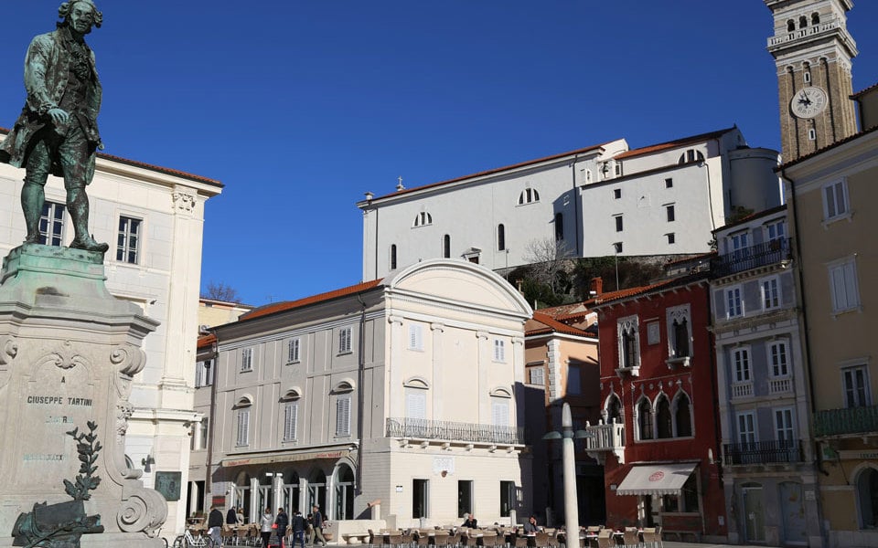 view of the outside of Piran Town Gallery from the Tartini town square