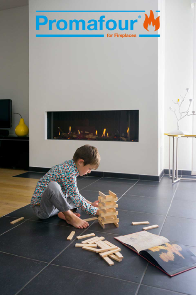 A child and a modern built-in fireplace using the PROMAFOUR® system