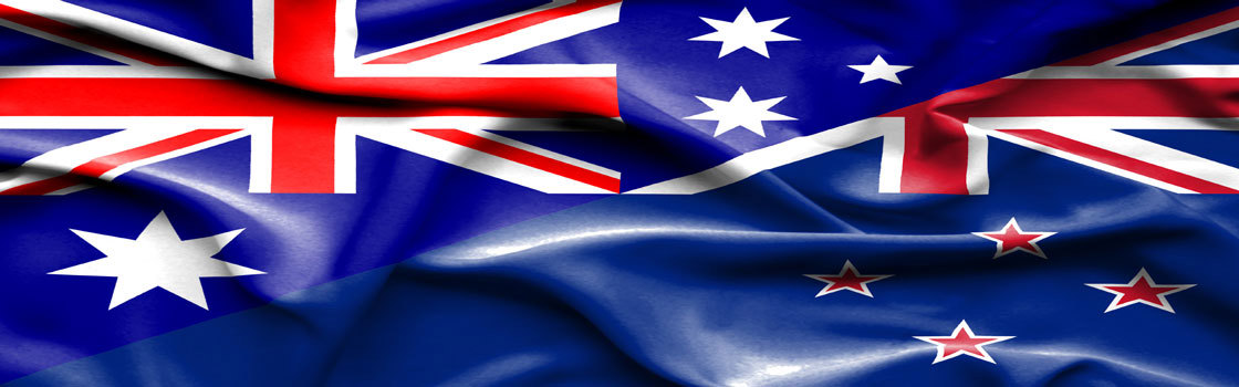 Slika plapolajoče avstralske in novo zelandske zastave.