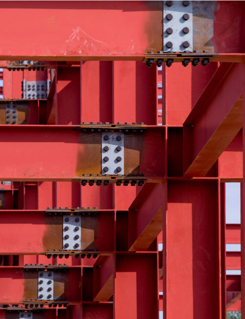 An image of a red load-bearing steel structure
